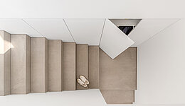 Minimalistischer Treppenschrank um die Treppe verbaut